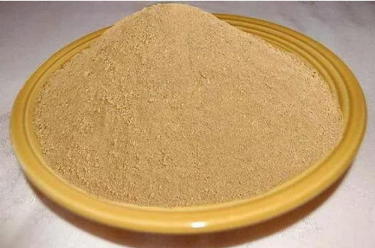 Rock Phosphate powder in bowl